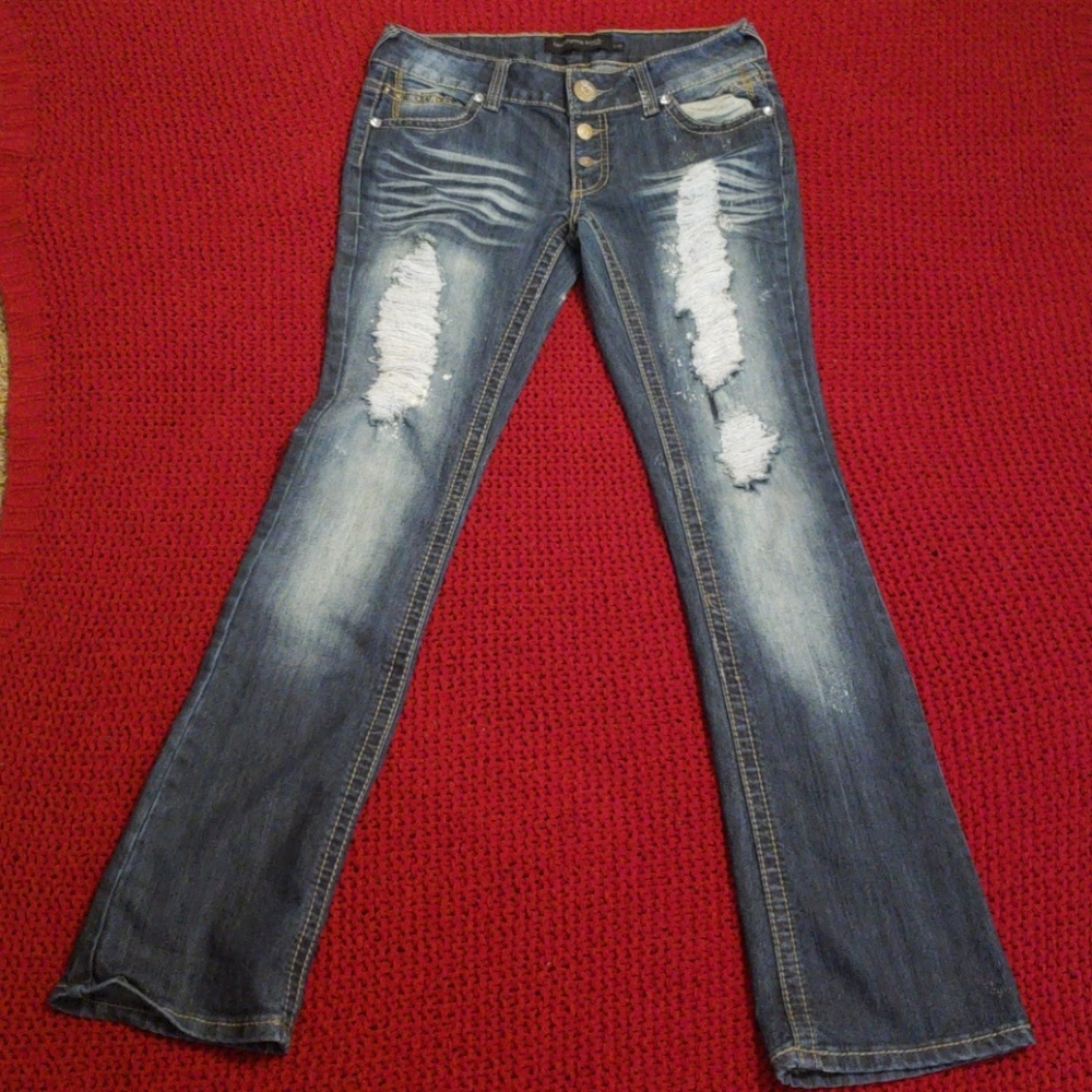 Distressed jeans.